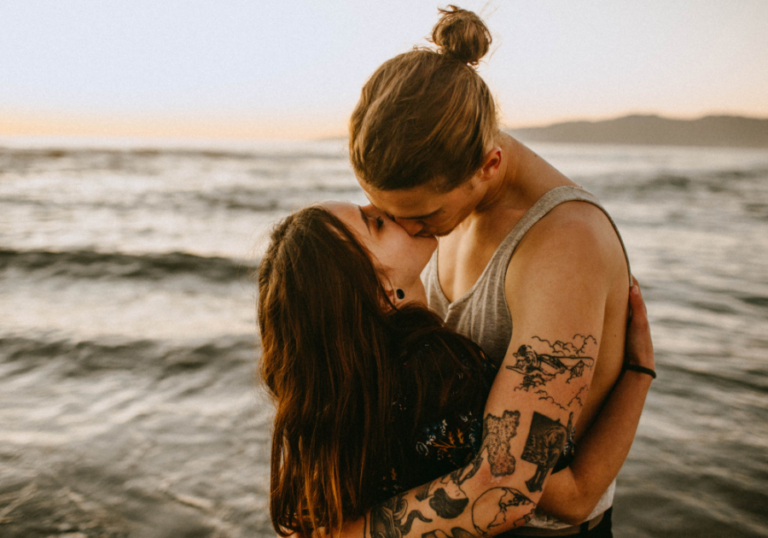 couple kissing by ocean Sexual Soul Ties