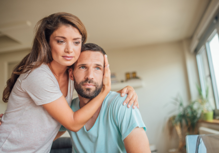 woman hugging and consoling man Signs of an Insecure Man