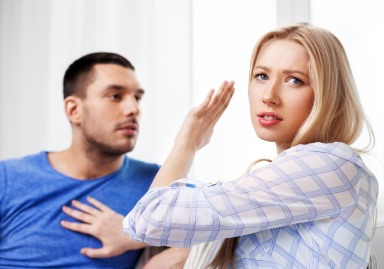 couple sitting woman pushing man away things toxic partners say