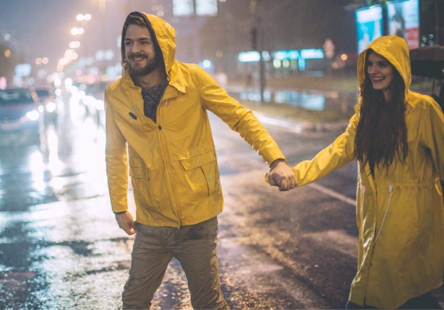 couple holding hands in rain crossing street Wife Material