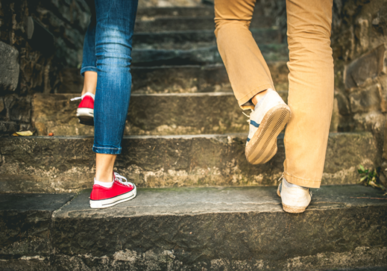 couple walking up steps Stepping Stones in a Relationship