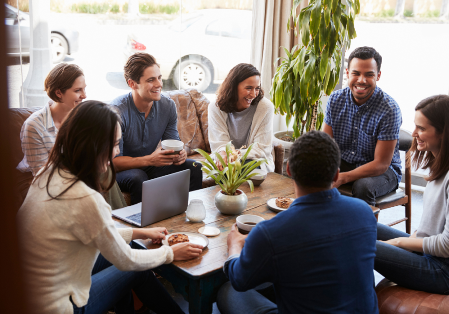 group sitting at coffee shop hot seat questions