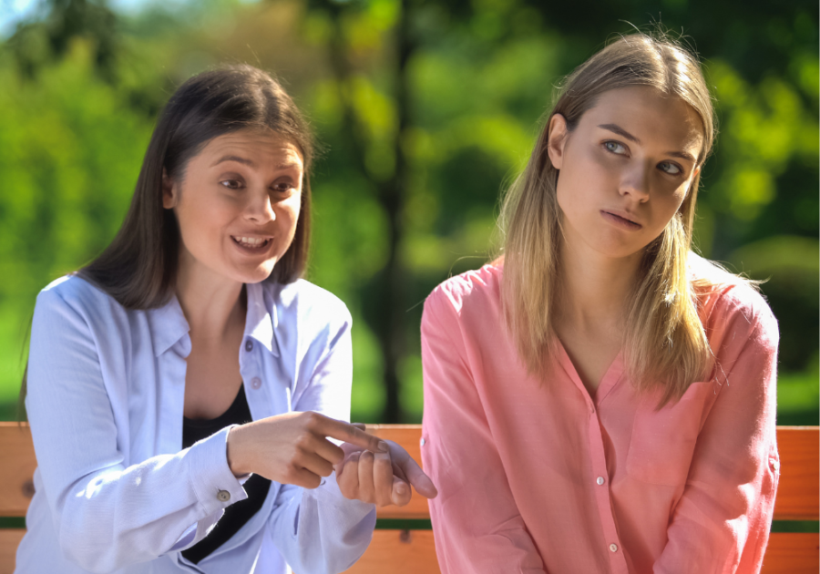 women talking outdoors upset Why Do I Hate People