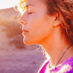 woman outdoors with closed eyes Healing From Trauma Quotes