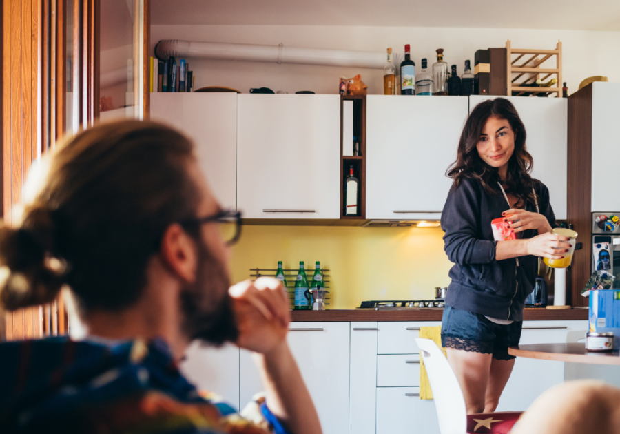 couple talking in kitchen Does Body Count Matter