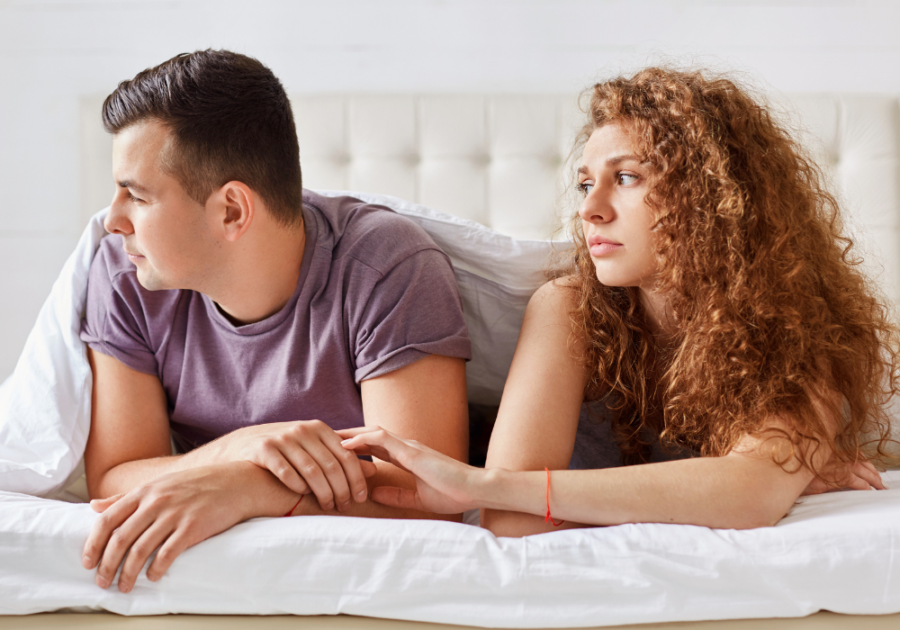 man and woman laying side by side how to apologize Apologize for Cheating